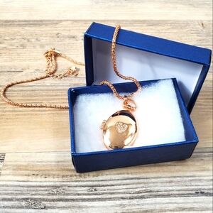 Rose gold colored locket necklace new!